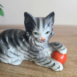 Vintage Germany(?) porcelain/ceramic kitten/cat playing with red bowl figurine.